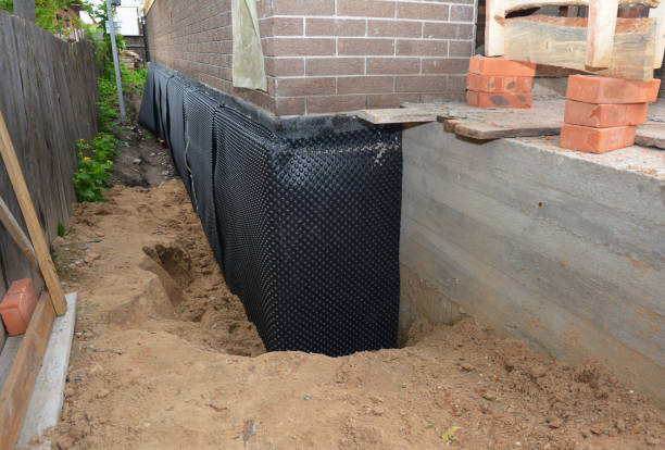 SJ Waterproofing Pros technician performing targeted Emergency Waterproofing assessment in Highwood, IL